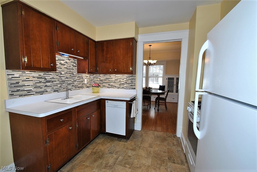 2456 Eaton Road Cleveland, OH 44118 - Photo 12 of 30 New backslash and under-cabinet lighting make this kitchen sparkle!