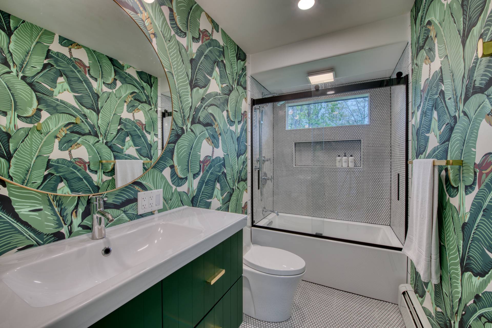 16 4th Street East Hampton, NY 11937 - Photo 11 of 18 a bathroom with a toilet a sink and shower
