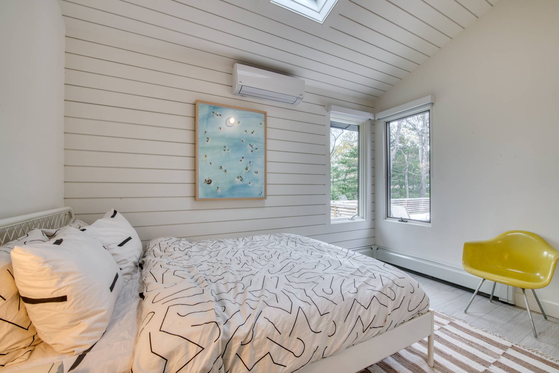 16 4th Street East Hampton, NY 11937 - Photo 12 of 18 a bedroom with a bed and window