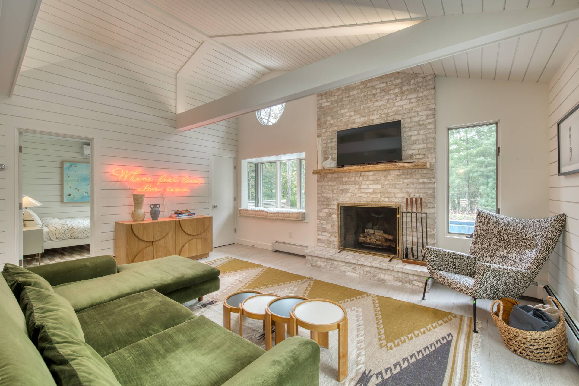 16 4th Street East Hampton, NY 11937 - Photo 9 of 18 a living room with furniture and a fireplace