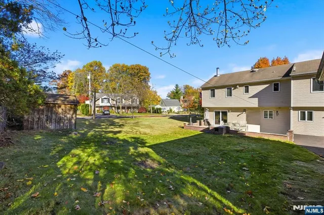 a view of a building with a big yard