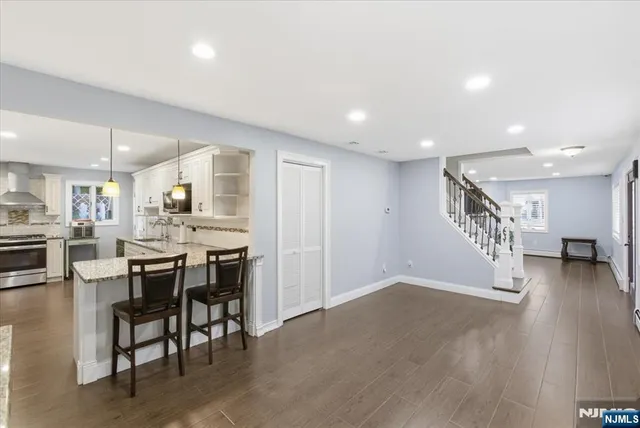 a view of a kitchen and dining room
