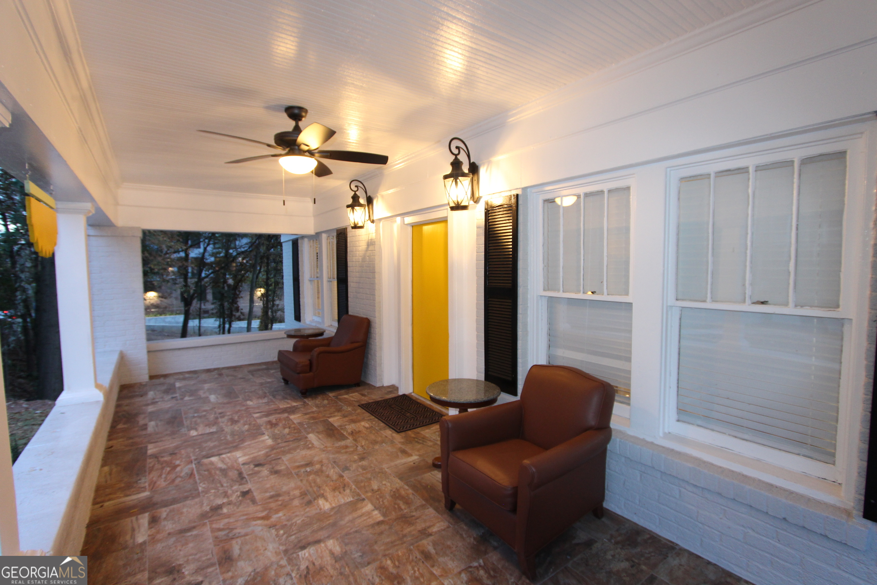 997 Boulevard Southeast Atlanta, GA 30315 - Photo 4 of 20 a living room with furniture a chandelier and a large window