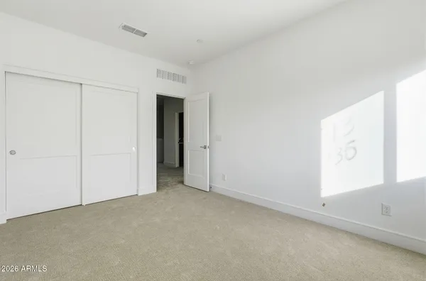a view of small space with racks on the wall