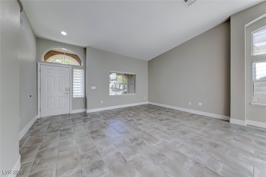 2401 Flower Spring Street Las Vegas, NV 89134 - Photo 7 of 42 Entrance foyer with baseboards and vaulted ceiling