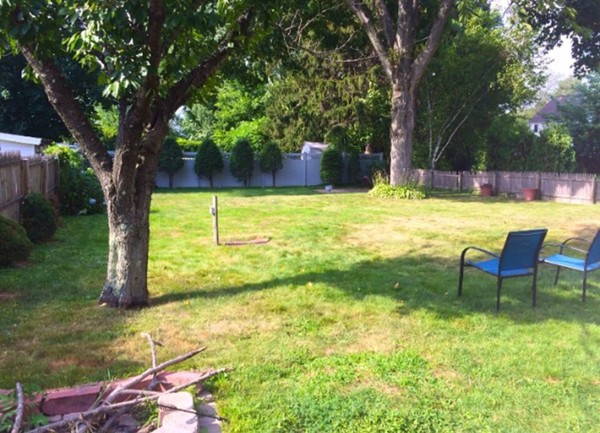284 Plumtree Road Springfield, MA 01118 - Photo 7 of 8 a view of swimming pool with a table and chairs