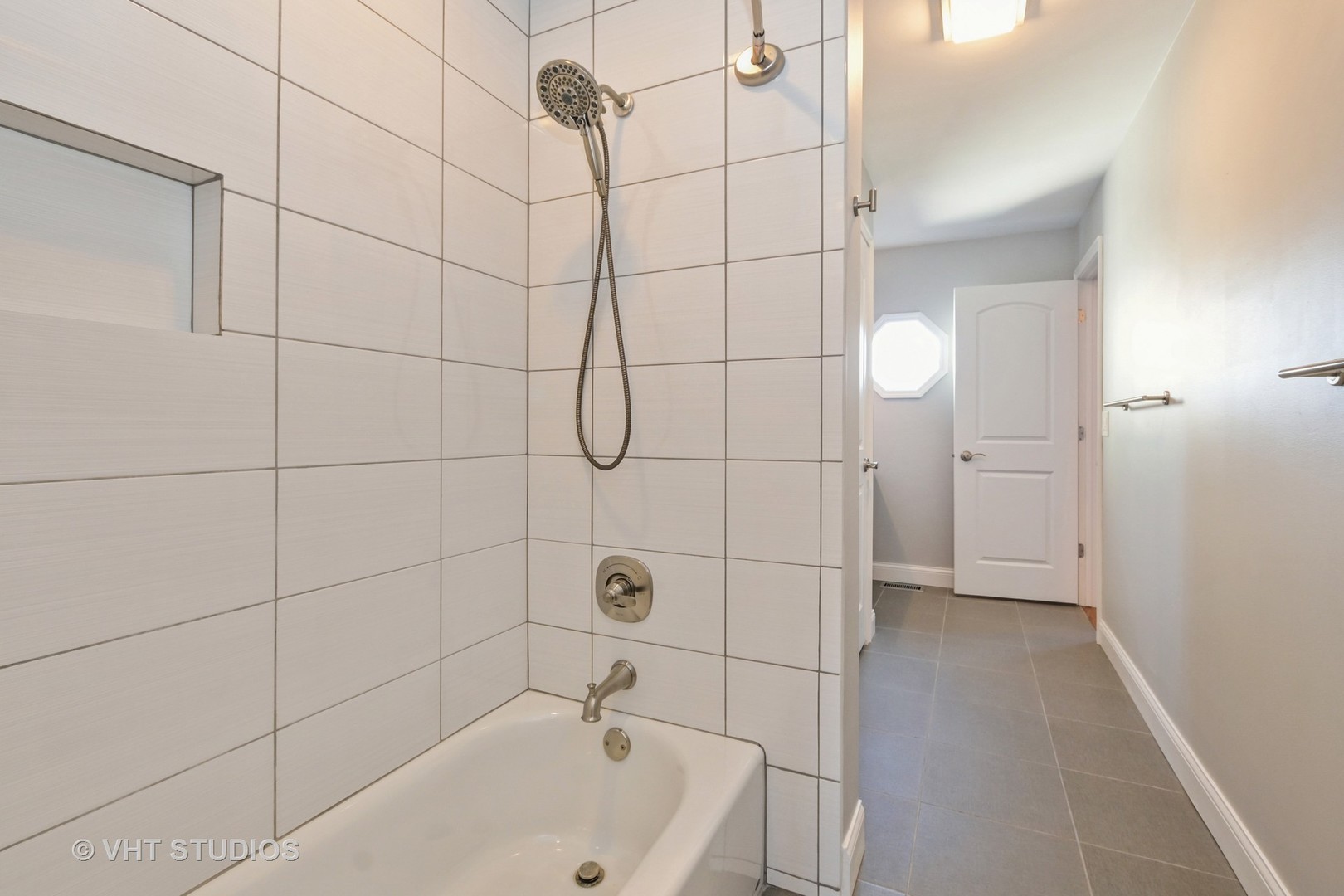 14740 Pine Tree Road Orland Park, IL 60462 - Photo 21 of 25 a bathroom with a bathtub and shower