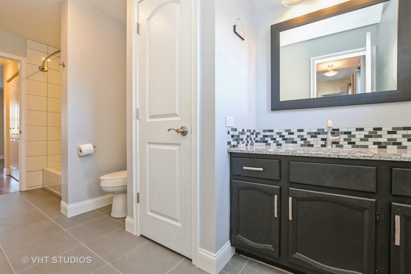 14740 Pine Tree Road Orland Park, IL 60462 - Photo 22 of 25 a bathroom with a sink a toilet and shower