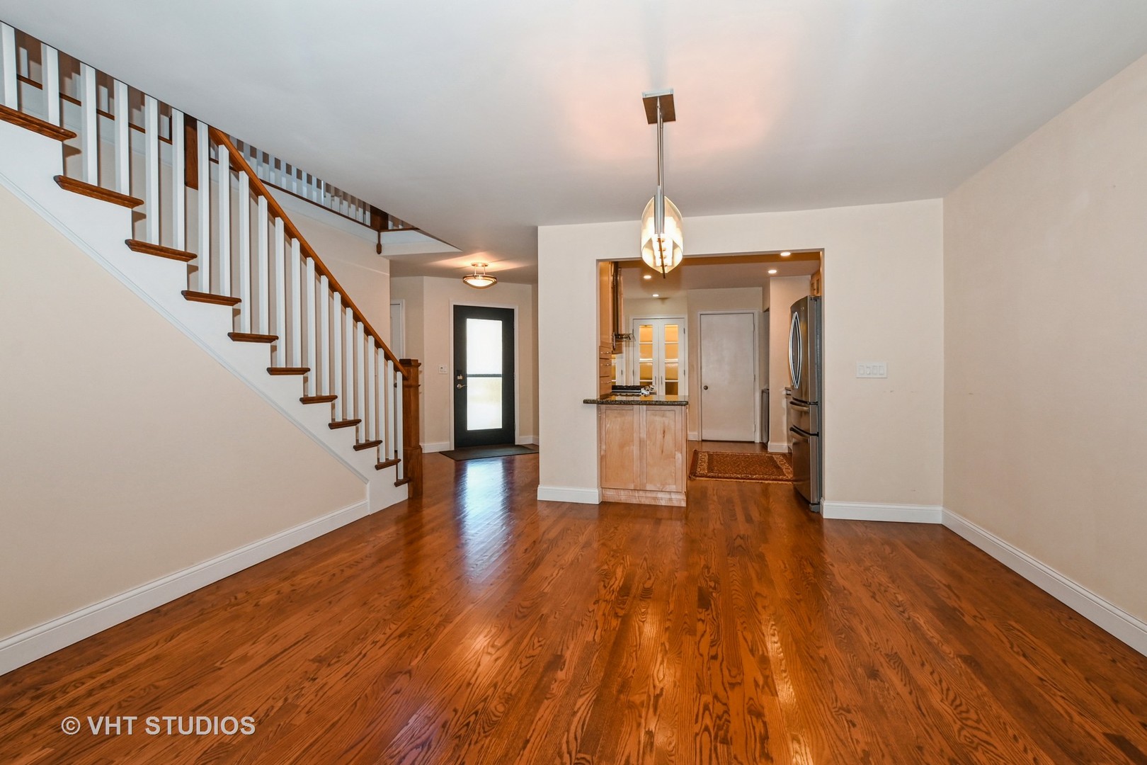 14740 Pine Tree Road Orland Park, IL 60462 - Photo 4 of 25 a view of empty room with wooden floor