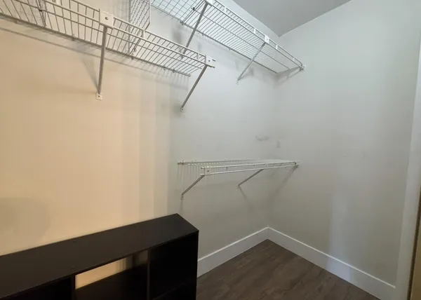 a view of a room with racks on the wall