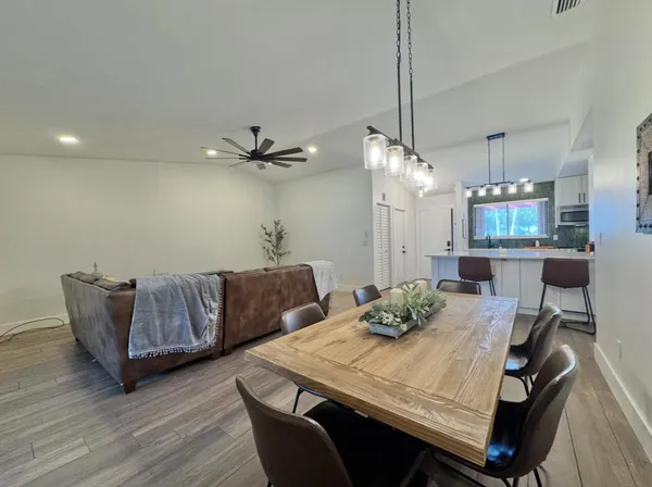 a living room with furniture and a table