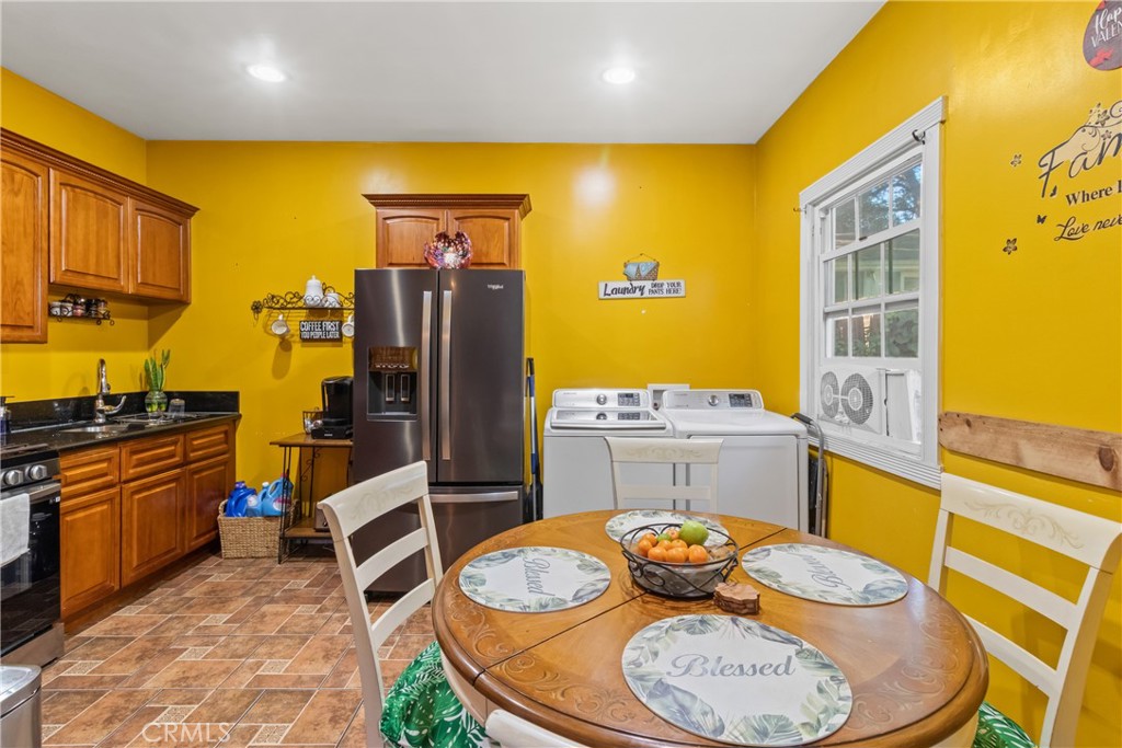 63 Yale Street Pasadena, CA 91103 - Photo 13 of 50 a kitchen with a sink stove and wooden floor