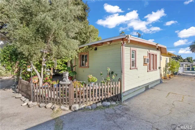 a front view of a house having yard