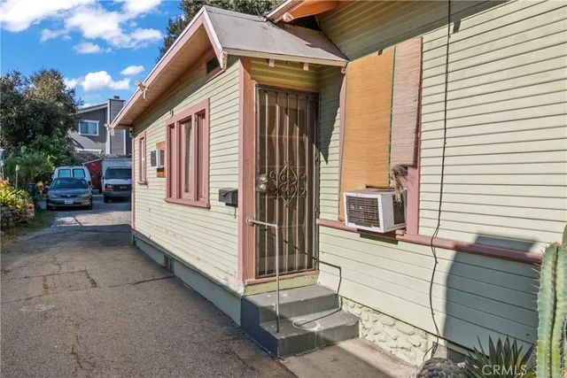 a view of a house with a large window