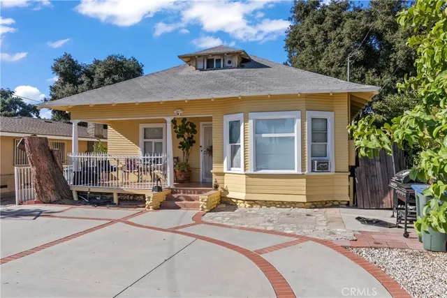 a front view of a house with a patio