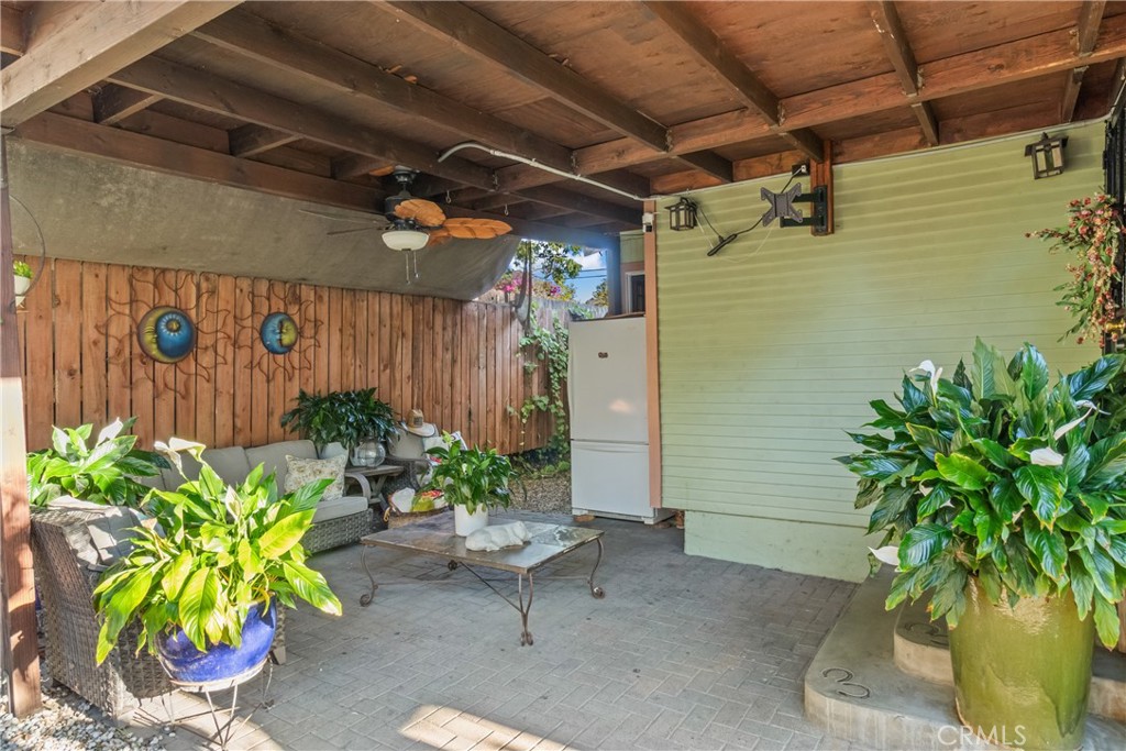 63 Yale Street Pasadena, CA 91103 - Photo 23 of 50 a view of a backyard with plants and a grill