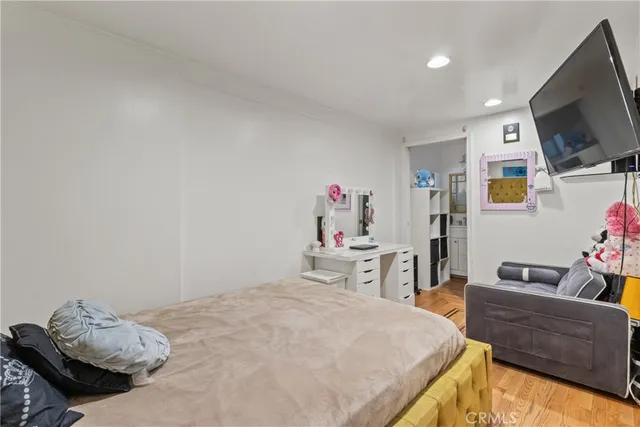 a bathroom with a granite countertop toilet a sink and a bathtub