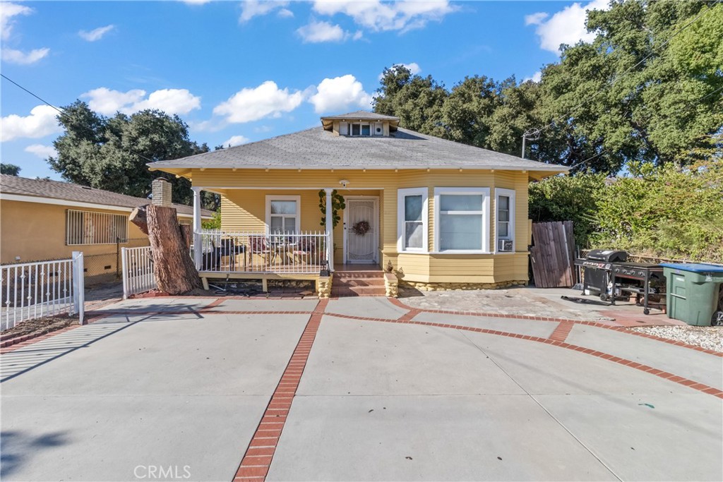 63 Yale Street Pasadena, CA 91103 - Photo 49 of 50 a front view of a house with basket ball court and outdoor seating