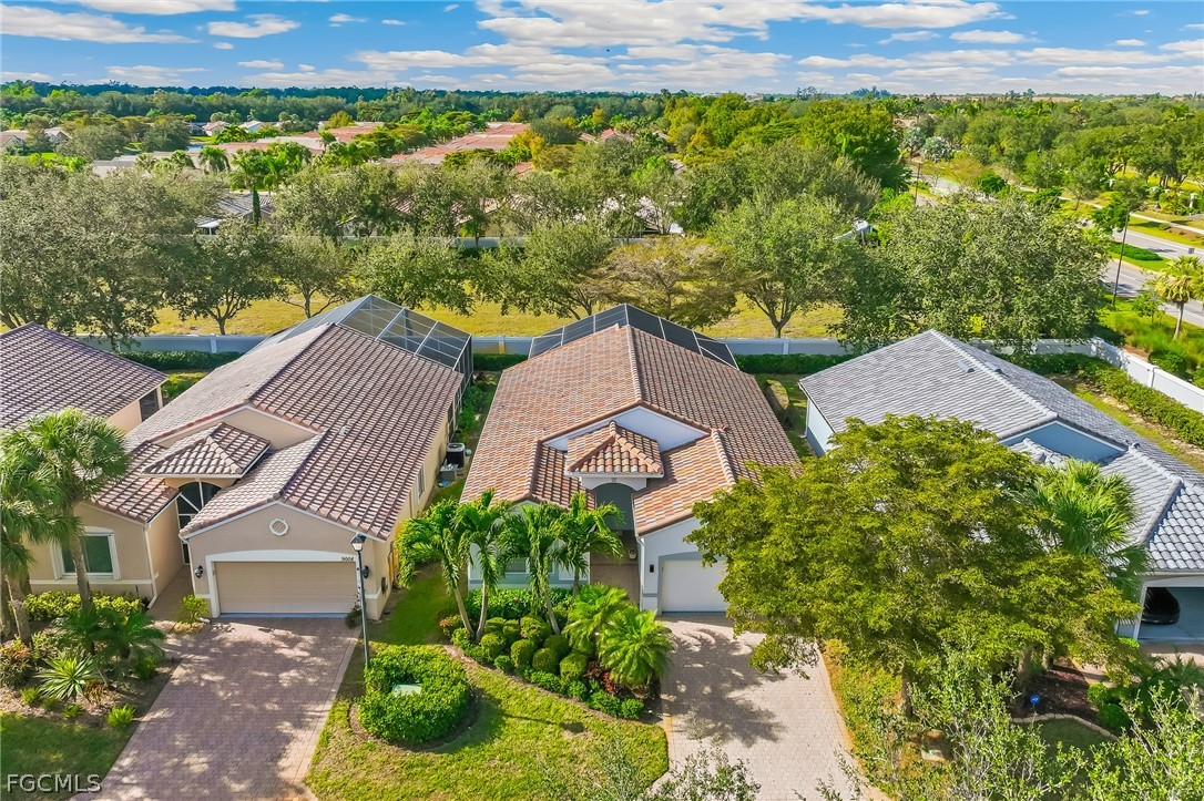 9004 Springview Loop Estero, FL 33928 - Photo 28 of 41 an aerial view of houses with yard