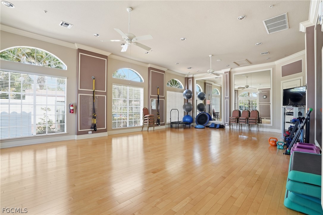 9004 Springview Loop Estero, FL 33928 - Photo 30 of 41 a view of a hall with wooden floor