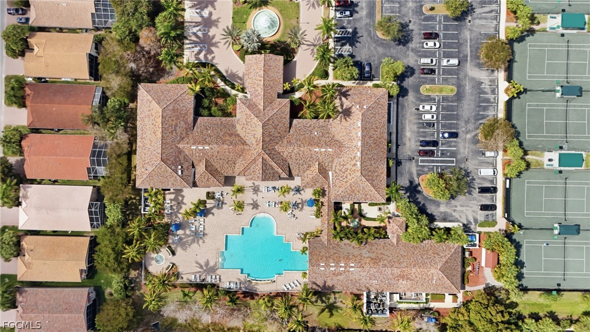 9004 Springview Loop Estero, FL 33928 - Photo 39 of 41 aerial view of a house with a yard and sitting area