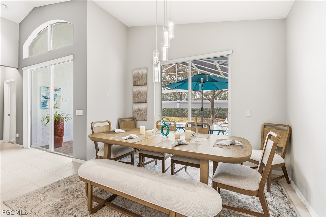9004 Springview Loop Estero, FL 33928 - Photo 8 of 41 a view of a dining room with furniture window and outside view