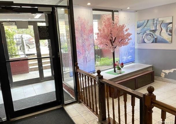 42-26 81st Street, Unit 2J Queens, NY 11373 - Photo 2 of 14 a view of a porch with wooden floor