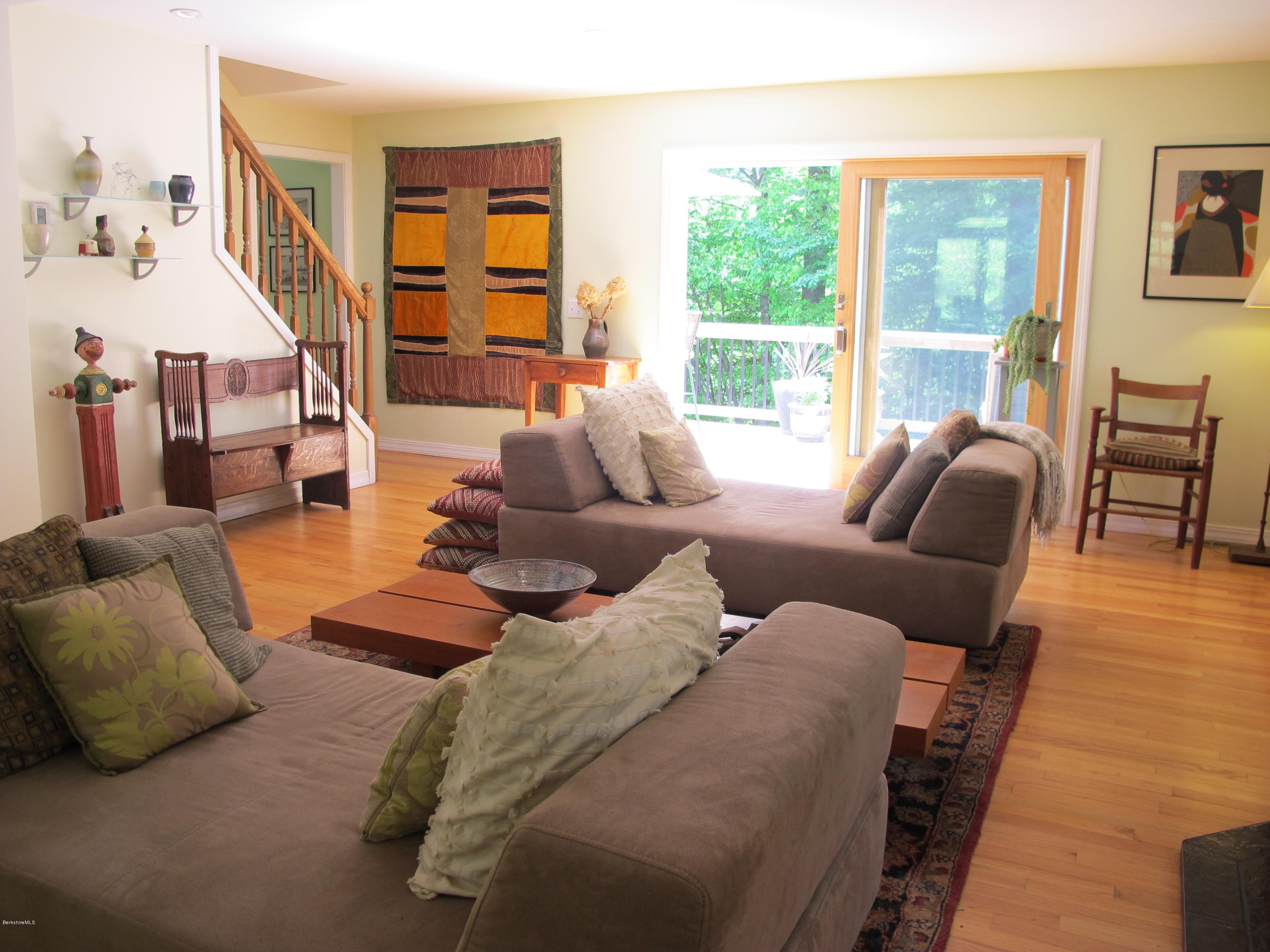 4 Stonebridge Way Tyringham, MA 01264 - Photo 13 of 40 a living room with furniture and a large window
