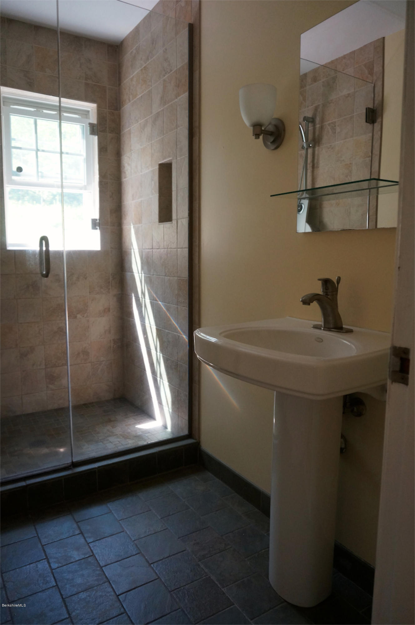 4 Stonebridge Way Tyringham, MA 01264 - Photo 14 of 40 a bathroom with a sink a mirror and shower