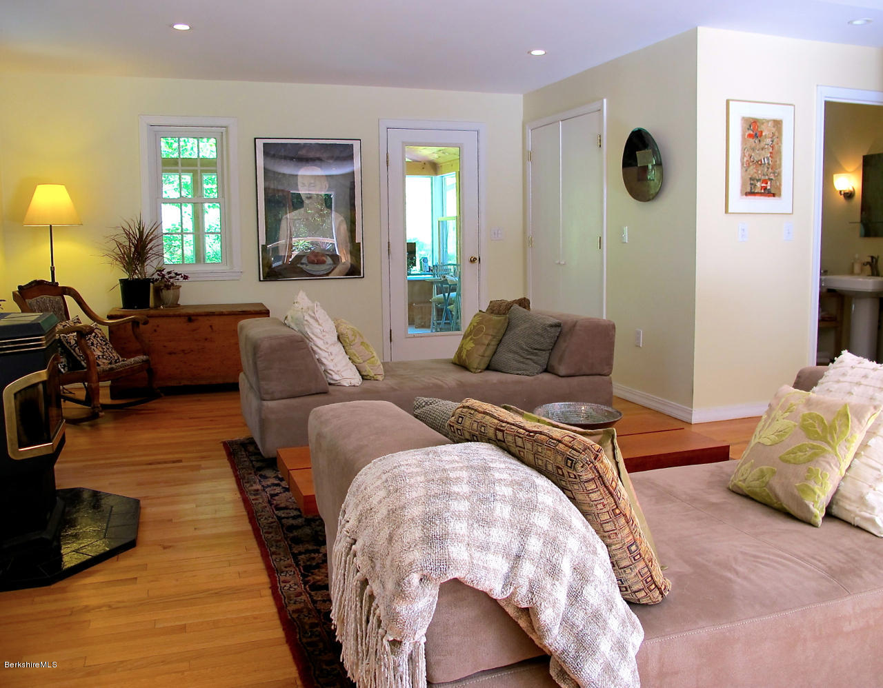 4 Stonebridge Way Tyringham, MA 01264 - Photo 16 of 40 a bedroom with double bed and a couch