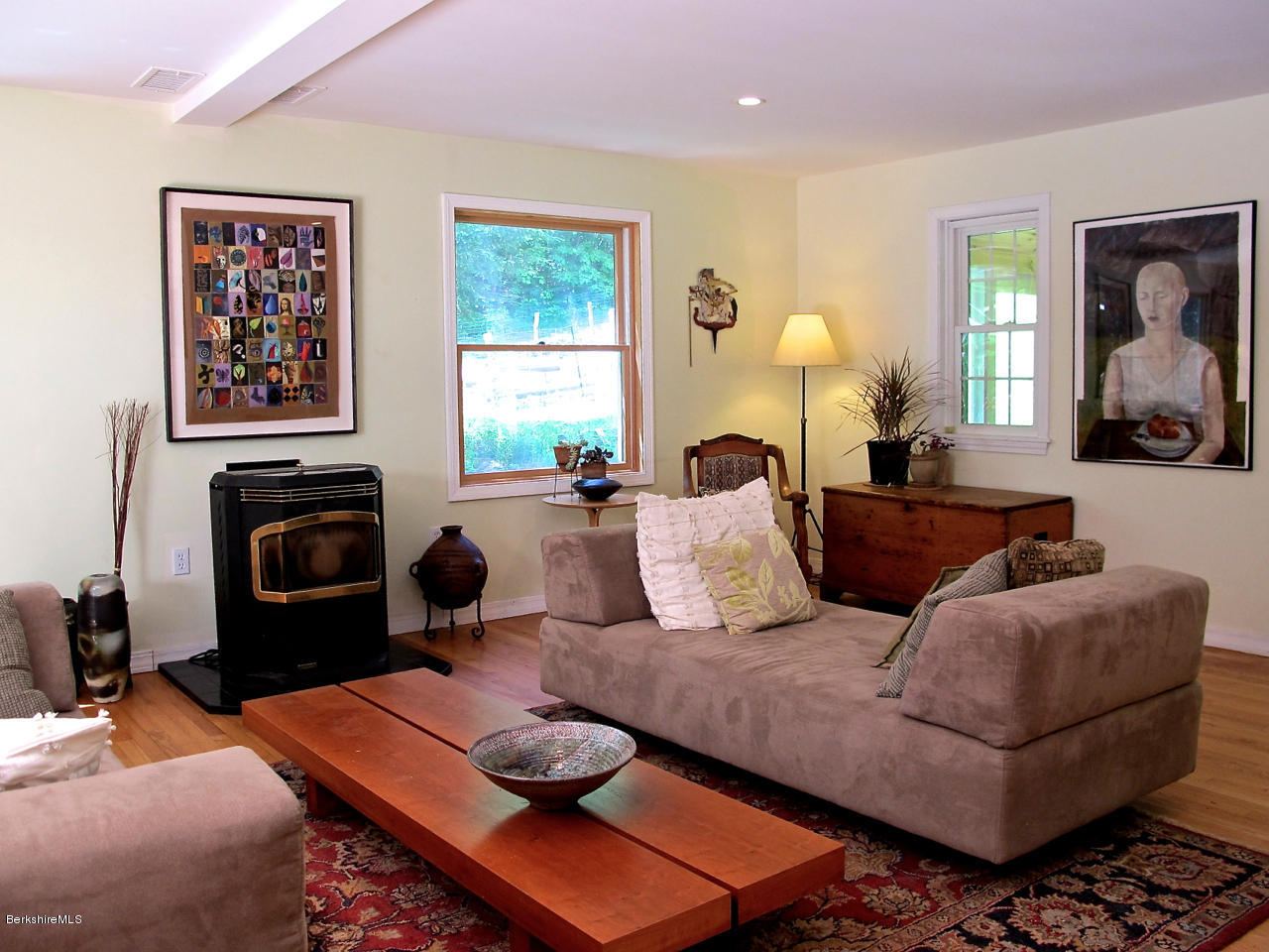 4 Stonebridge Way Tyringham, MA 01264 - Photo 17 of 40 a living room with furniture fireplace and window