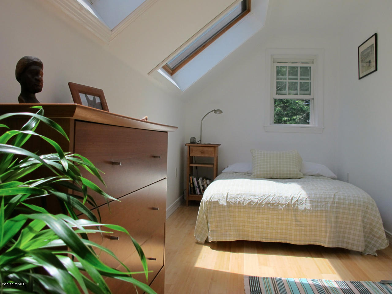 4 Stonebridge Way Tyringham, MA 01264 - Photo 27 of 40 a bedroom with a bed and a window