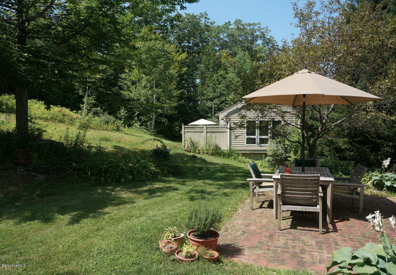 4 Stonebridge Way Tyringham, MA 01264 - Photo 32 of 40 a garden view with a seating space