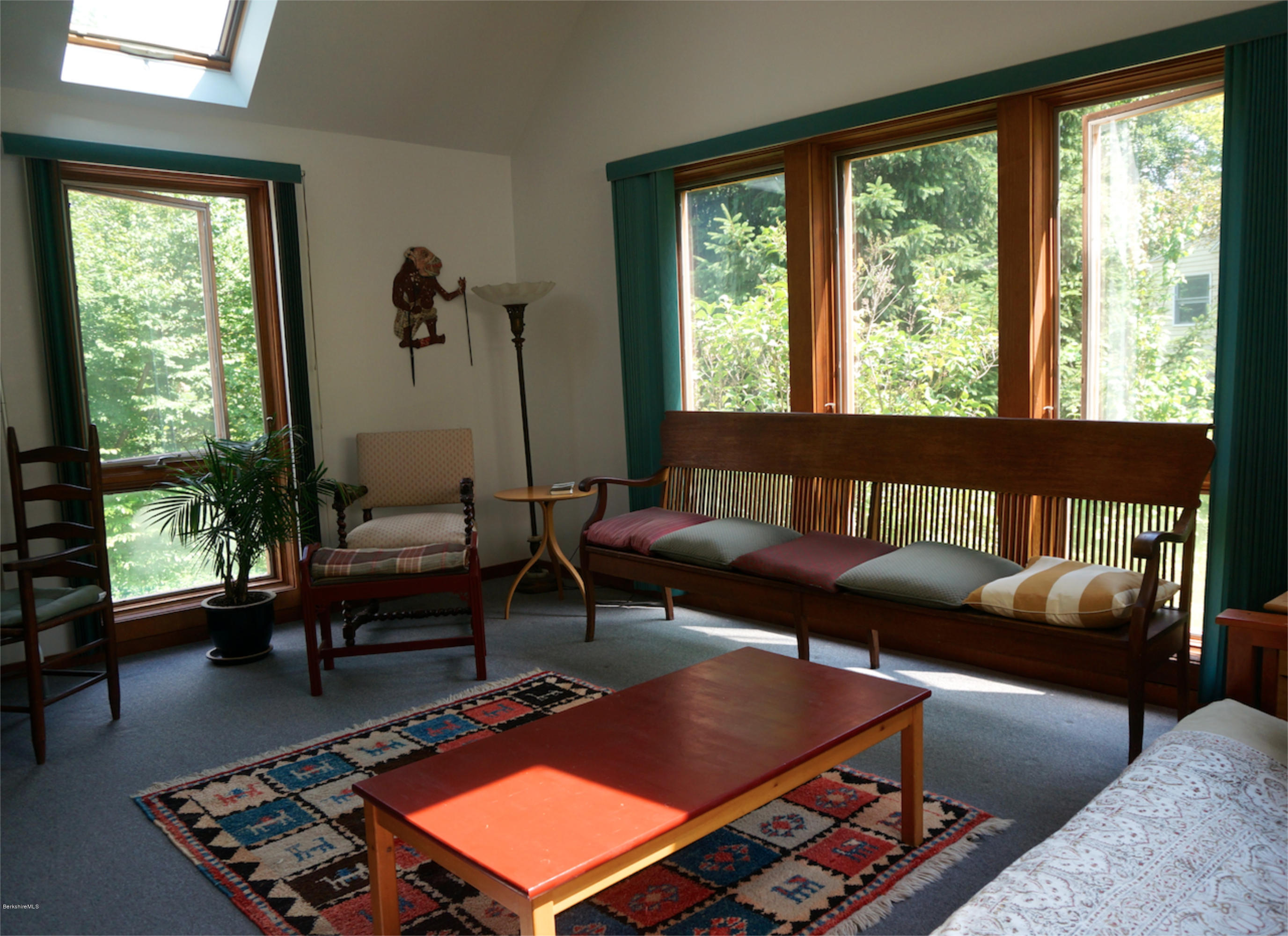 4 Stonebridge Way Tyringham, MA 01264 - Photo 35 of 40 a living room with furniture and a window