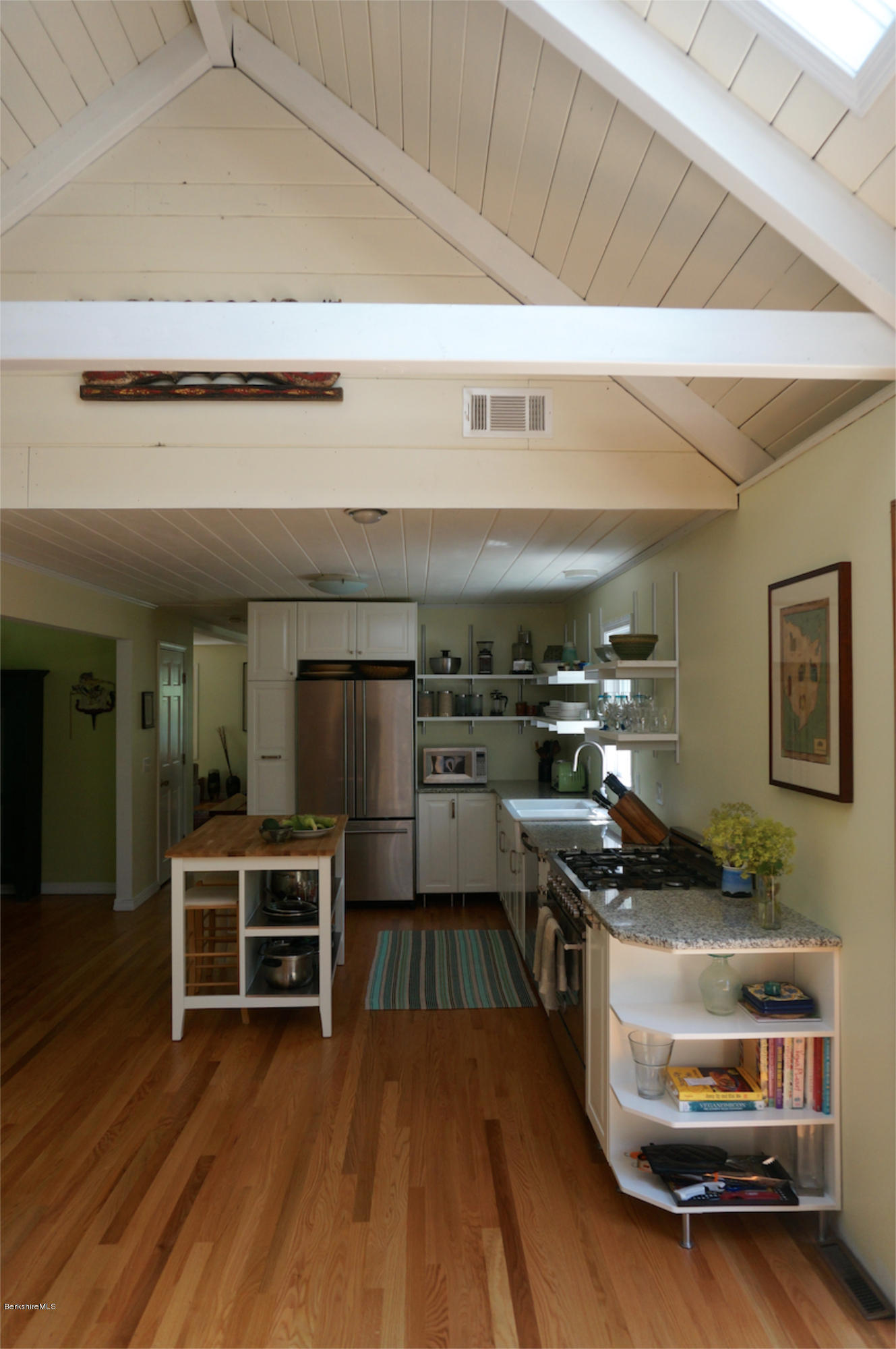 4 Stonebridge Way Tyringham, MA 01264 - Photo 8 of 40 a kitchen with a stove and a microwave
