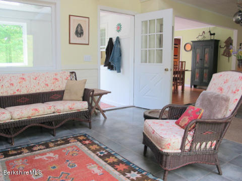 4 Stonebridge Way Tyringham, MA 01264 - Photo 10 of 40 a living room with furniture and a rug
