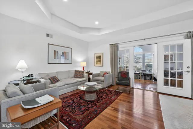 a kitchen with stainless steel appliances a refrigerator sink and microwave