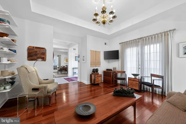 a living room with furniture or couch and a window