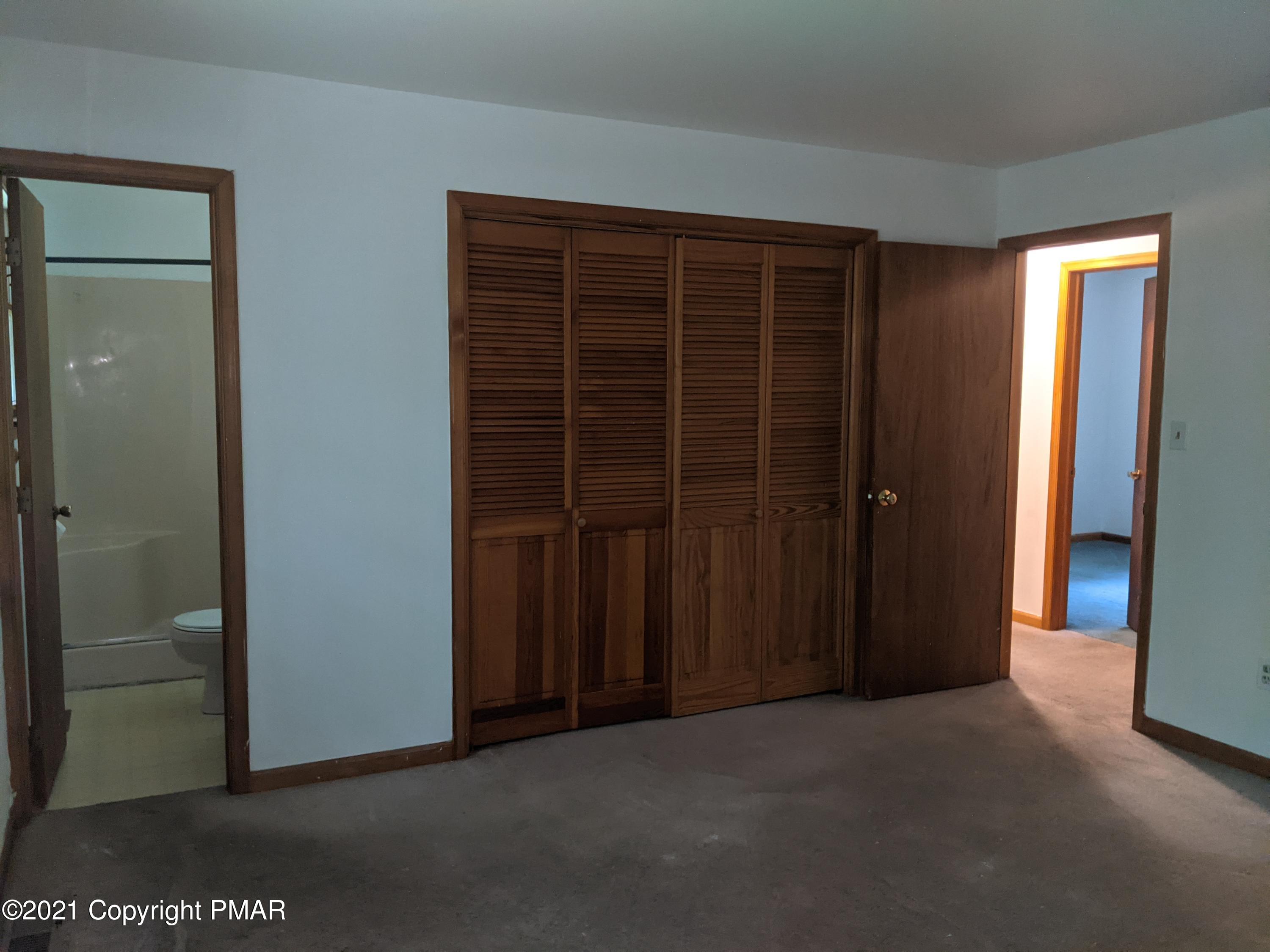 180 Shenkel Road Effort, PA 18330 - Photo 11 of 24 an empty room with closet