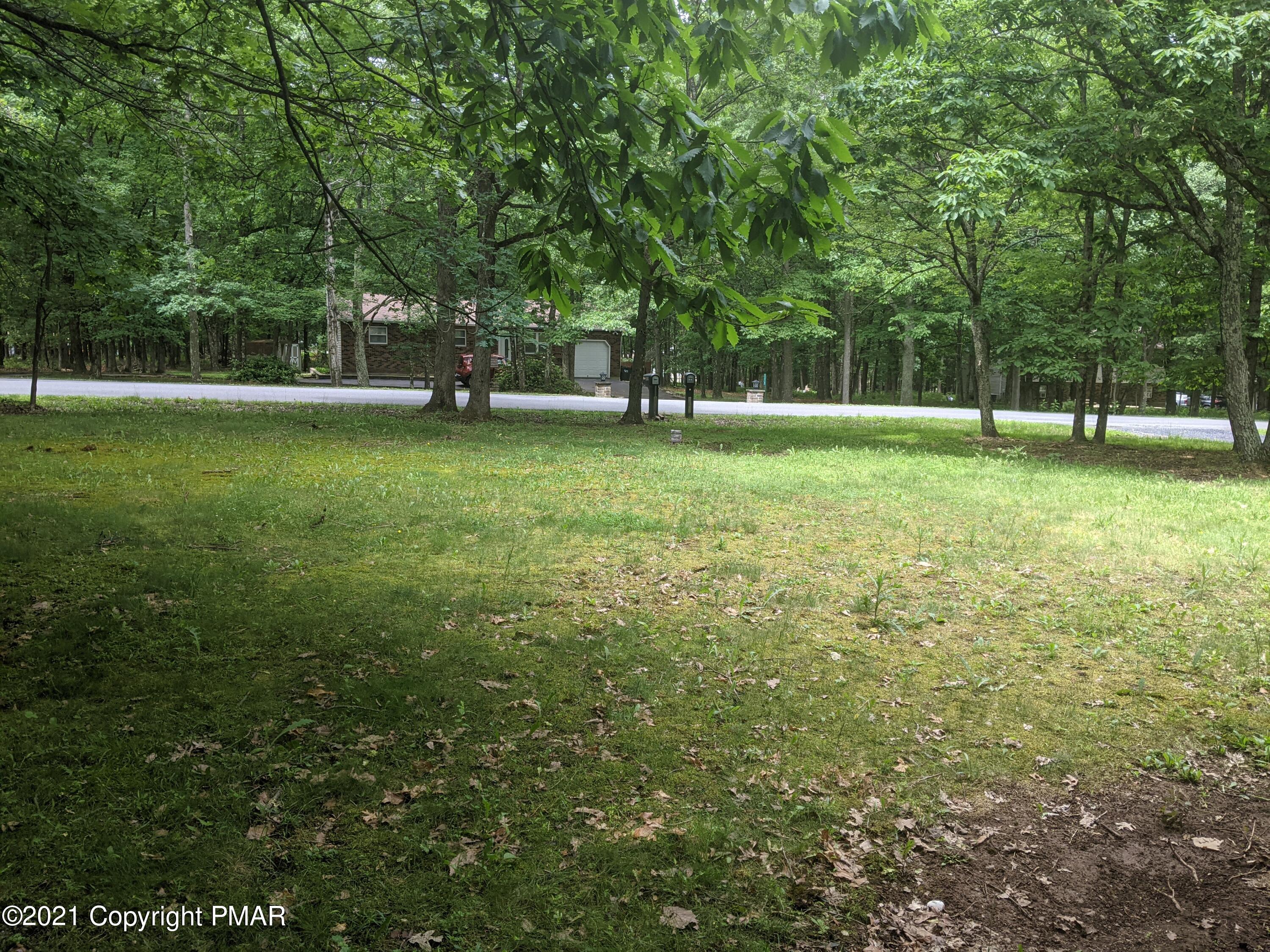 180 Shenkel Road Effort, PA 18330 - Photo 23 of 24 a view of a park with trees in the background