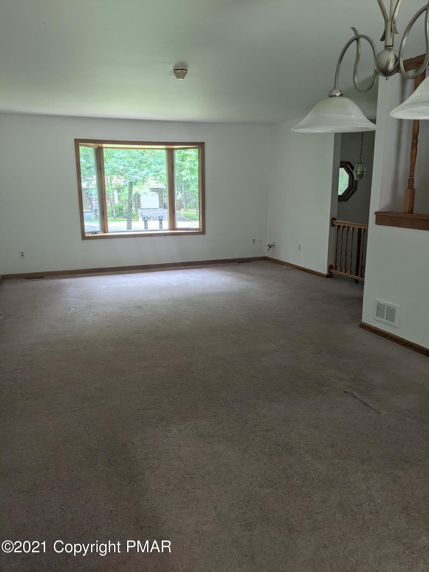 180 Shenkel Road Effort, PA 18330 - Photo 5 of 24 an empty room with a window