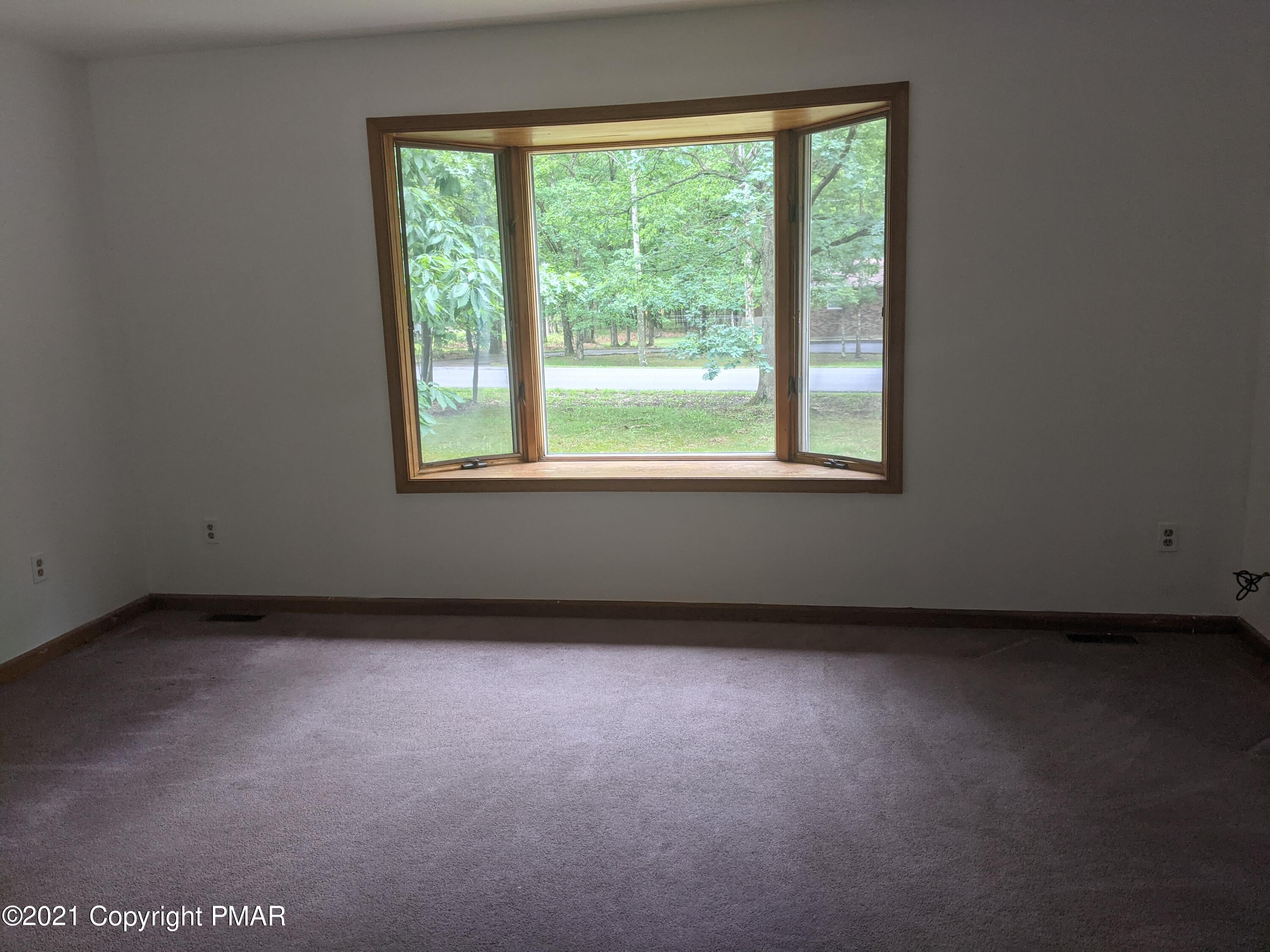 180 Shenkel Road Effort, PA 18330 - Photo 6 of 24 an empty room with a window