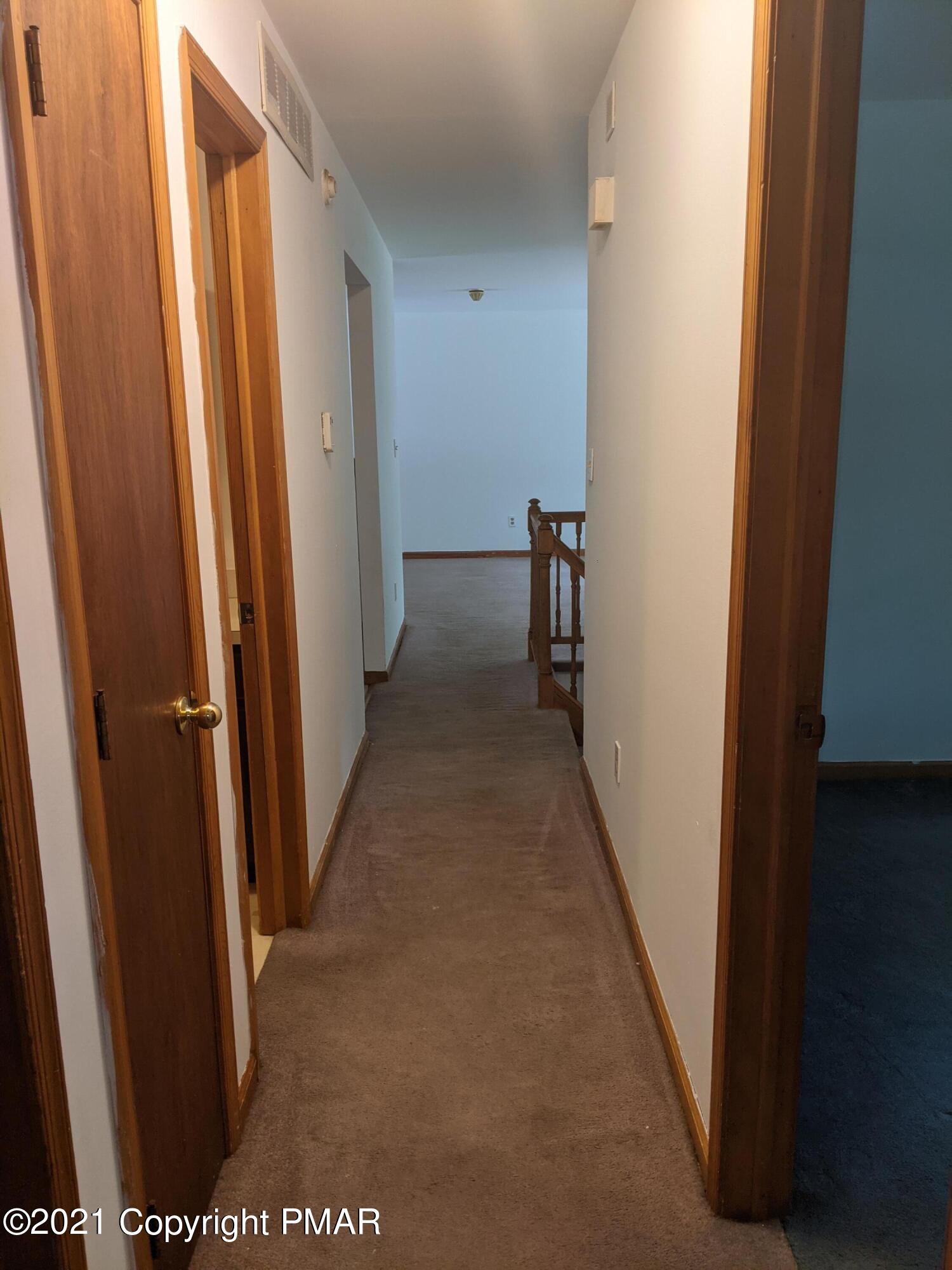 180 Shenkel Road Effort, PA 18330 - Photo 7 of 24 a view of hallway with stairs