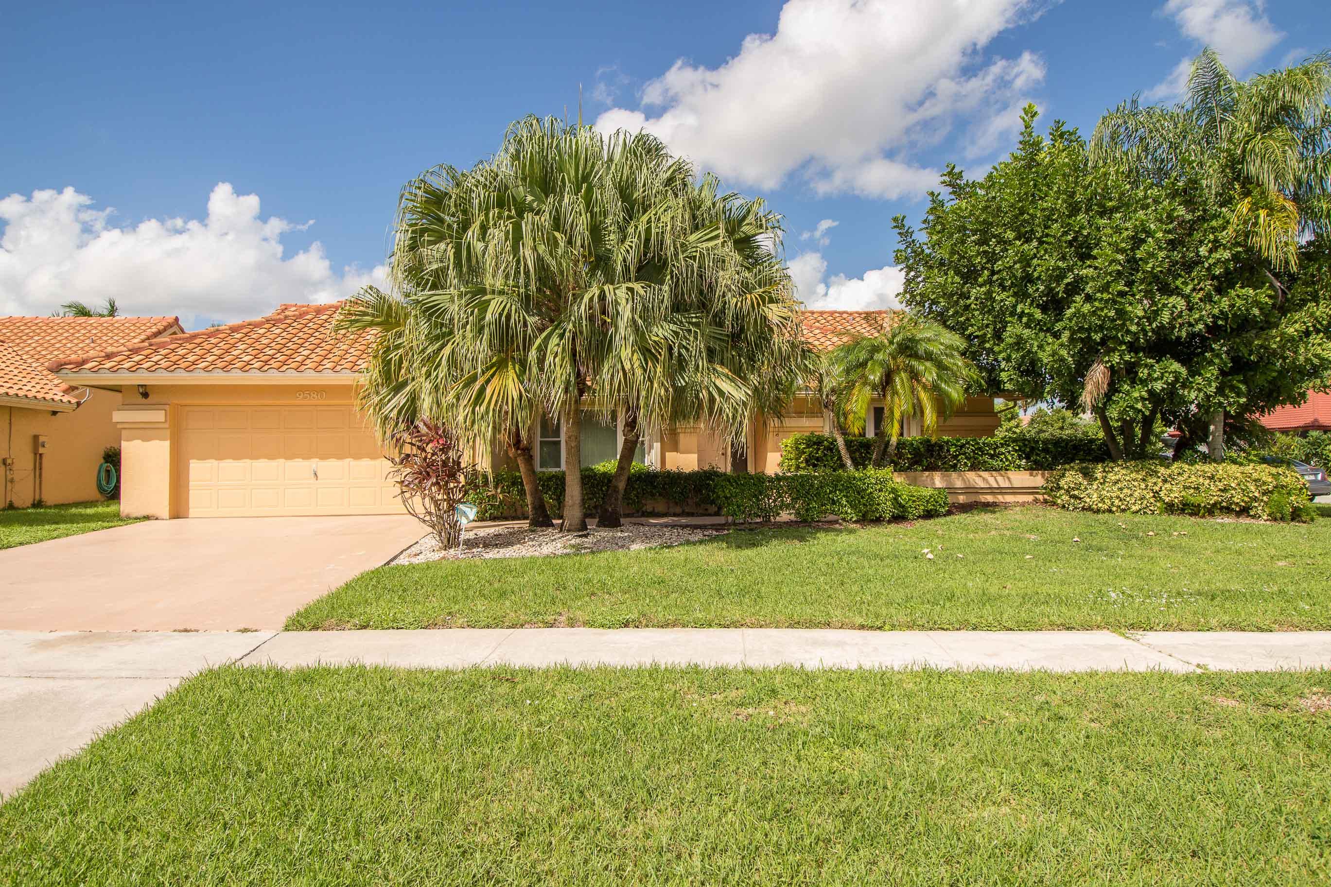 9580 El Clair Ranch Road Boynton Beach, FL 33437 - Photo 1 of 26 Front