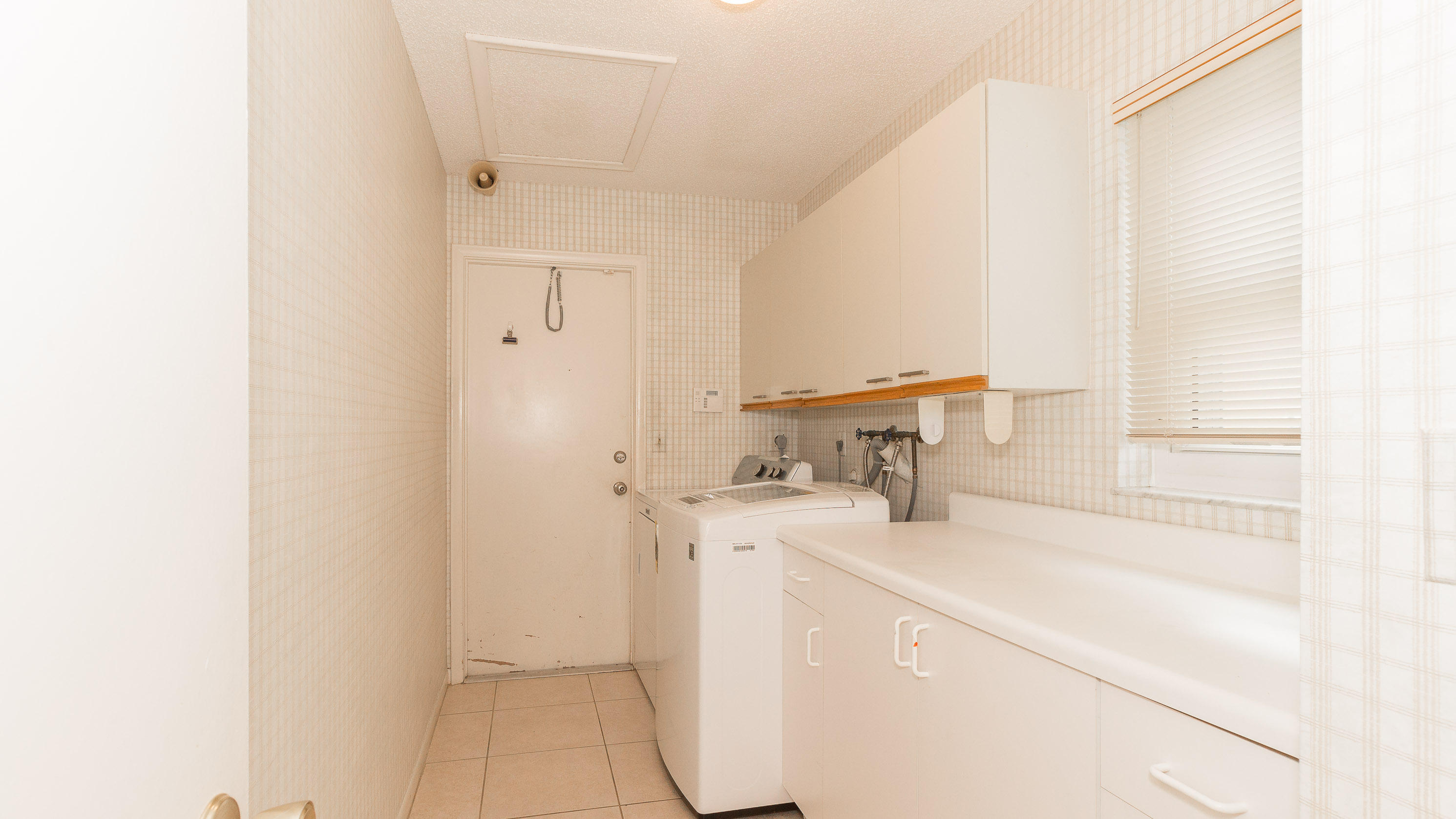 9580 El Clair Ranch Road Boynton Beach, FL 33437 - Photo 25 of 26 Indoor Laundry