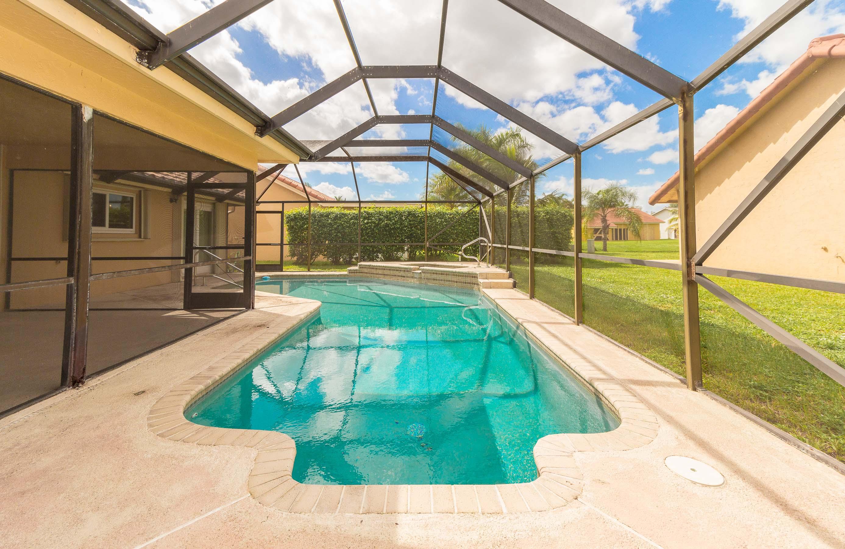 9580 El Clair Ranch Road Boynton Beach, FL 33437 - Photo 8 of 26 Screened in Pool