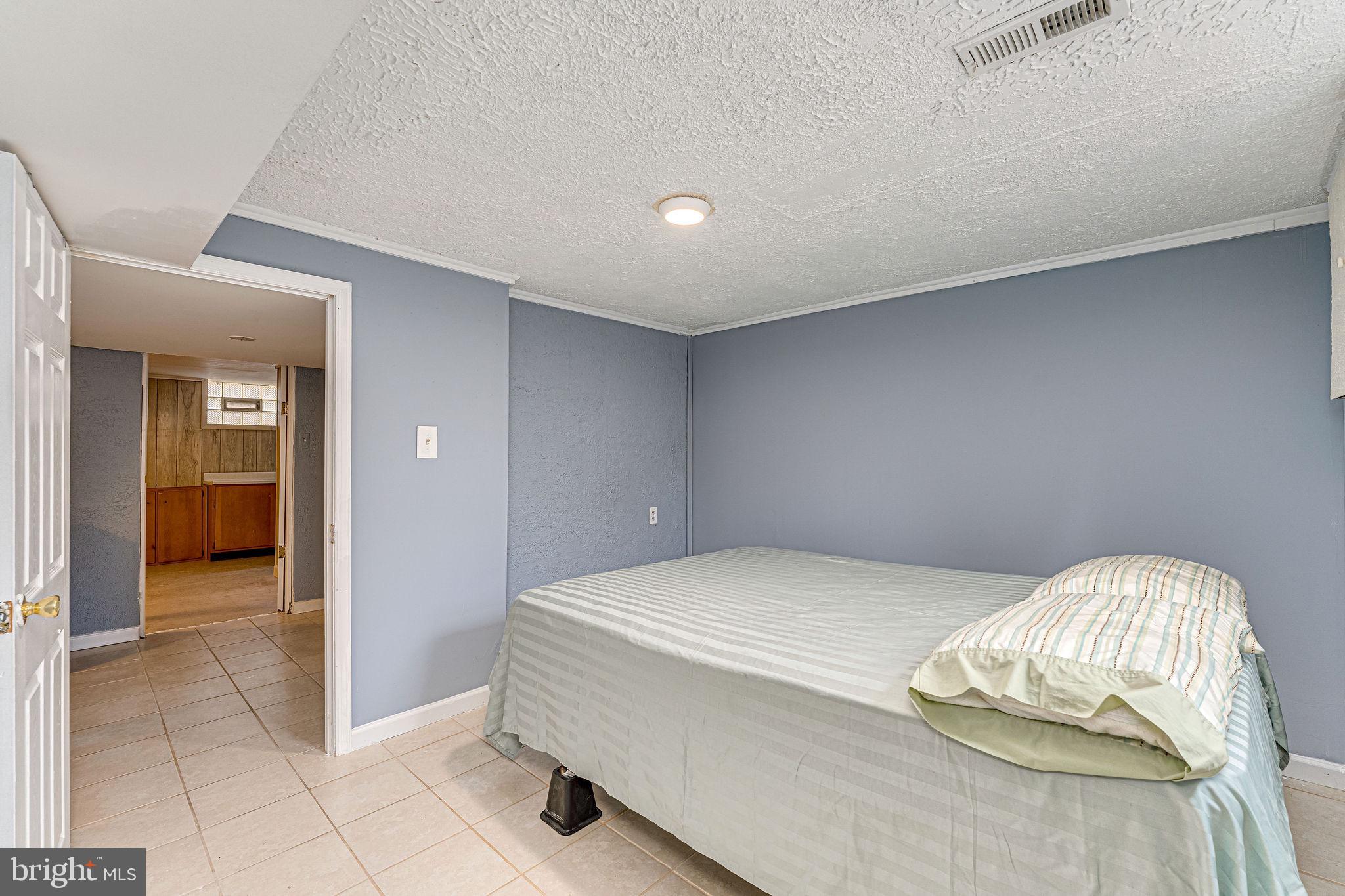 932 Milford Mill Road Baltimore, MD 21208 - Photo 33 of 43 Basement Bedroom