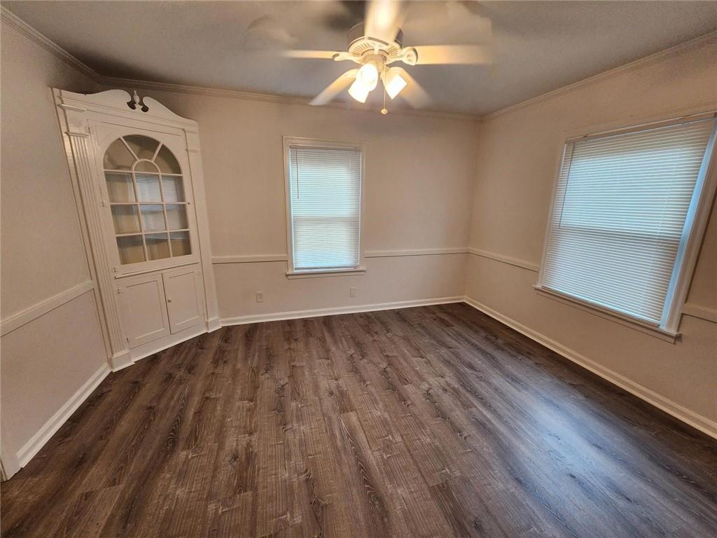 2431 North Decatur Road Decatur, GA 30033 - Photo 11 of 34 an empty room with wooden floor fan and windows
