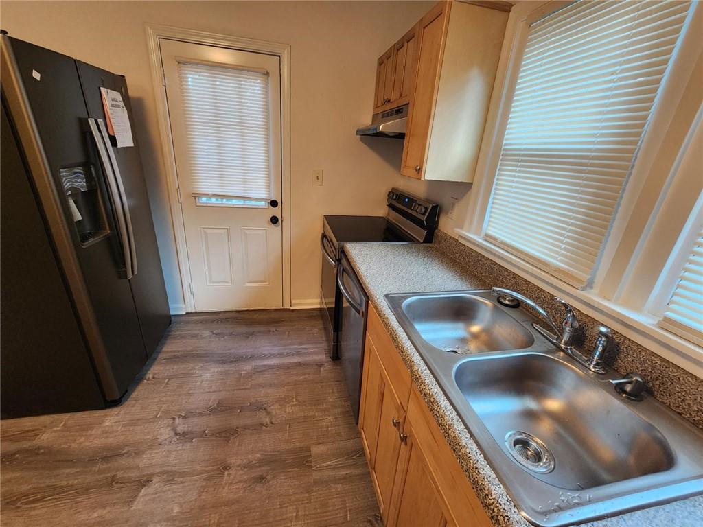2431 North Decatur Road Decatur, GA 30033 - Photo 17 of 34 a bathroom with a sink a toilet and shower