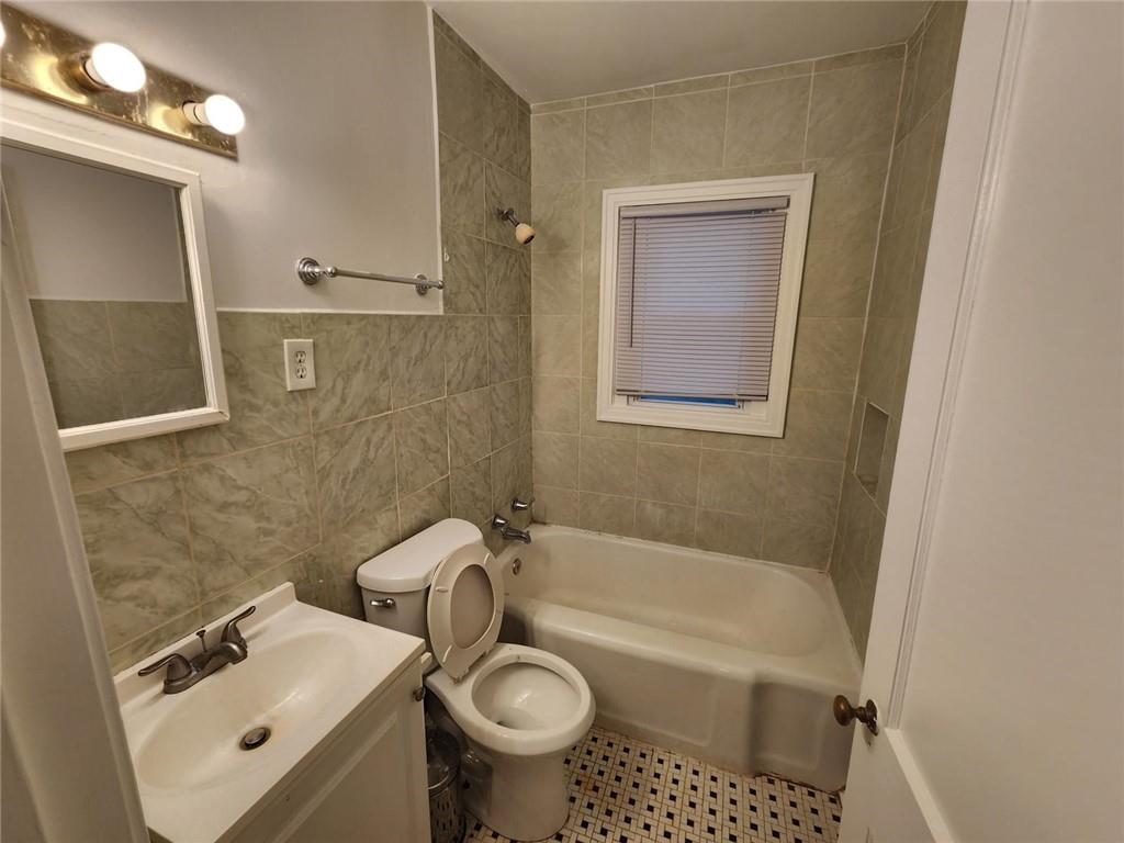 2431 North Decatur Road Decatur, GA 30033 - Photo 20 of 34 a bathroom with a sink a toilet and shower